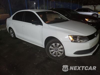 Czwarte zdjęcie samochodu z boku: 2014 VOLKSWAGEN JETTA BASE VIN:3VW2K7AJ2EM328136 - miniatura