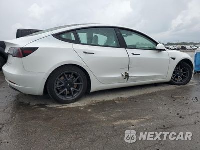 Trzecie zdjęcie samochodu z tyłu: 2021 TESLA MODEL 3 VIN:5YJ3E1EB3MF999882 - miniatura