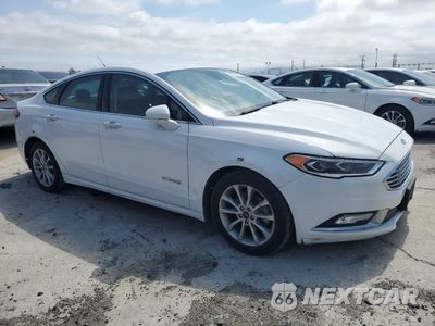 Czwarte zdjęcie samochodu z boku: 2017 FORD FUSION SE HYBRID VIN:3FA6P0LU9HR409734 - miniatura