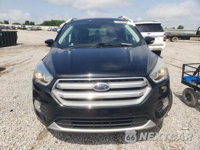 Piąte zdjęcie samochodu w środku: 2017 FORD ESCAPE TITANIUM VIN:1FMCU0JD0HUC08995 - miniatura