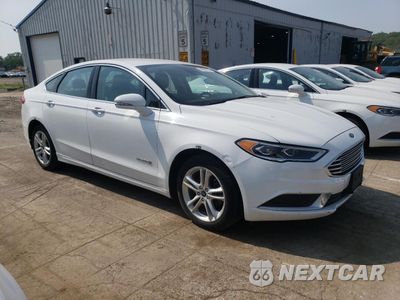 Czwarte zdjęcie samochodu z boku: 2018 FORD FUSION SE HYBRID VIN:3FA6P0LU3JR172079 - miniatura