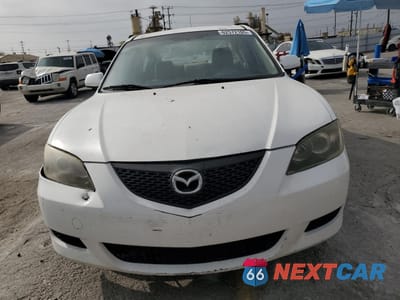 Piąte zdjęcie samochodu w środku: 2004 MAZDA 3 I VIN:JM1BK12F141165338 - miniatura