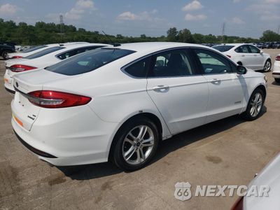 Trzecie zdjęcie samochodu z tyłu: 2018 FORD FUSION SE HYBRID VIN:3FA6P0LU8JR129857 - miniatura