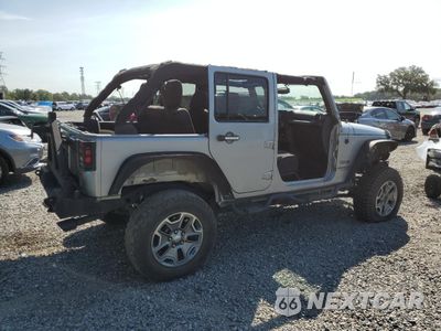 Trzecie zdjęcie samochodu z tyłu: 2014 JEEP WRANGLER UNLIMITED SPORT VIN:1C4BJWDG7EL135692 - miniatura