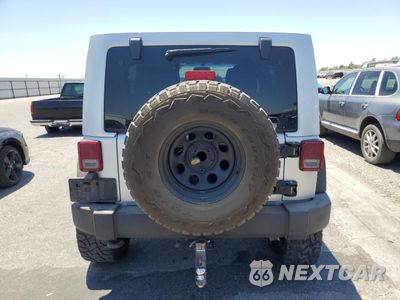 Zdjęcie 6 z 12 samochodu: 2012 JEEP WRANGLER UNLIMITED RUBICON VIN:1C4BJWFG2CL259220 - miniatura