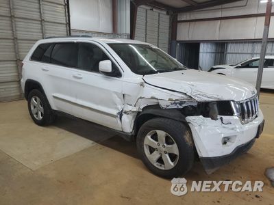 Czwarte zdjęcie samochodu z boku: 2013 JEEP GRAND CHEROKEE LAREDO VIN:1C4RJFAG9DC544407 - miniatura