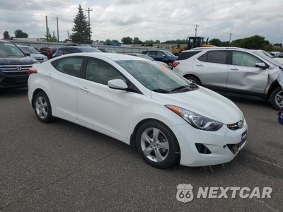 Czwarte zdjęcie samochodu z boku: 2013 HYUNDAI ELANTRA GLS VIN:5NPDH4AE0DH336316 - miniatura