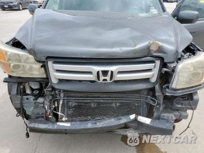 Zdjęcie 12 z 13 samochodu: 2007 HONDA PILOT EXL VIN:2HKYF18757H519485 - miniatura