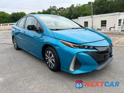 Czwarte zdjęcie samochodu z boku: 2022 TOYOTA PRIUS PRIME LE VIN:JTDKAMFP7N3203457 - miniatura