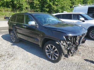 Czwarte zdjęcie samochodu z boku: 2017 JEEP GRAND CHEROKEE OVERLAND VIN:1C4RJFCG3HC684651 - miniatura