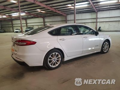 Trzecie zdjęcie samochodu z tyłu: 2019 FORD FUSION SE VIN:3FA6P0LU2KR124784 - miniatura