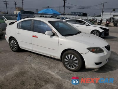 Czwarte zdjęcie samochodu z boku: 2004 MAZDA 3 I VIN:JM1BK12F141165338 - miniatura