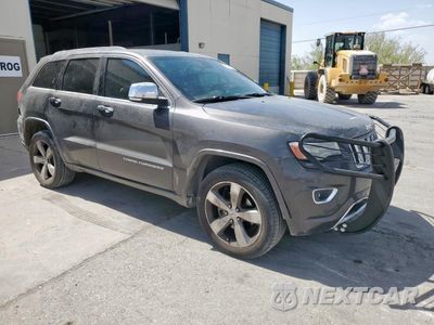 Czwarte zdjęcie samochodu z boku: 2014 JEEP GRAND CHEROKEE OVERLAND VIN:1C4RJECG0EC260771 - miniatura
