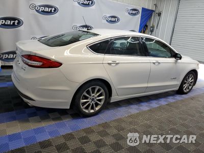 Trzecie zdjęcie samochodu z tyłu: 2017 FORD FUSION SE HYBRID VIN:3FA6P0LU8HR409496 - miniatura