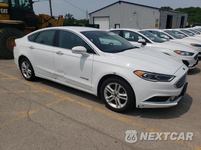 Czwarte zdjęcie samochodu z boku: 2018 FORD FUSION SE HYBRID VIN:3FA6P0LU1JR172081 - miniatura