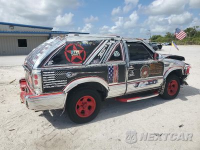 Trzecie zdjęcie samochodu z tyłu: 2000 CHEVROLET BLAZER VIN:1GNCS18WXYK252125 - miniatura