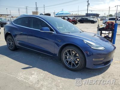 Czwarte zdjęcie samochodu z boku: 2018 TESLA MODEL 3 VIN:5YJ3E1EA4JF059030 - miniatura
