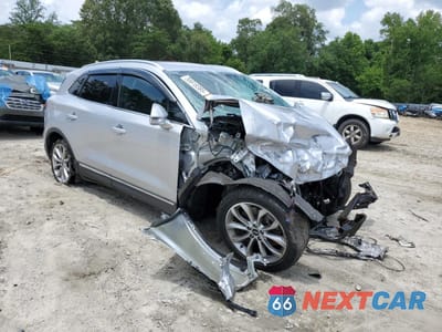 Czwarte zdjęcie samochodu z boku: 2018 LINCOLN MKC SELECT VIN:5LMCJ2D96JUL19050 - miniatura