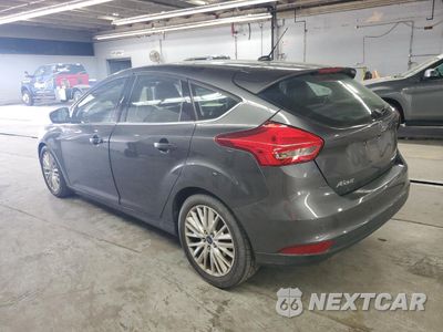 Drugie zdjęcie samochodu z przodu: 2017 FORD FOCUS TITANIUM VIN:1FADP3N22HL256987 - miniatura