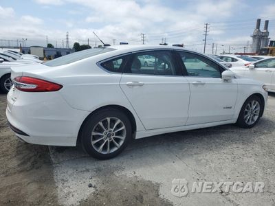 Trzecie zdjęcie samochodu z tyłu: 2017 FORD FUSION SE HYBRID VIN:3FA6P0LU5HR409486 - miniatura