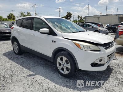 Czwarte zdjęcie samochodu z boku: 2016 FORD ESCAPE SE VIN:1FMCU9GX6GUC67344 - miniatura
