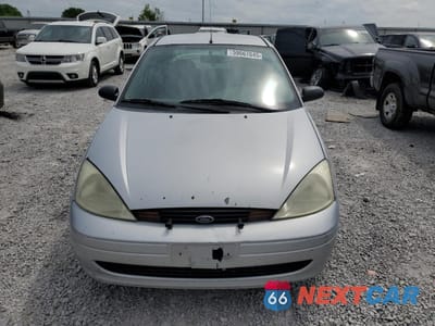 Piąte zdjęcie samochodu w środku: 2002 FORD FOCUS LX VIN:1FAFP33P72W253645 - miniatura