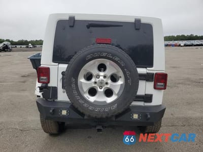 Zdjęcie 6 z 14 samochodu: 2015 JEEP WRANGLER UNLIMITED SAHARA VIN:1C4HJWEG6FL561285 - miniatura
