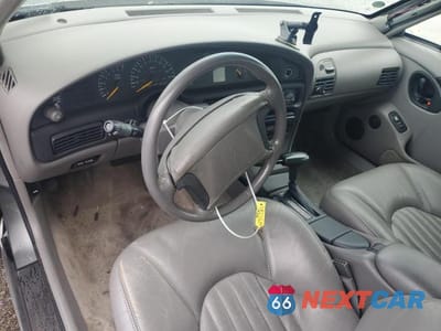 Zdjęcie 8 z 12 samochodu: 1993 PONTIAC BONNEVILLE SE VIN:1G2HX53L2P1272186 - miniatura