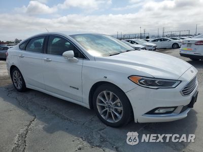 Czwarte zdjęcie samochodu z boku: 2017 FORD FUSION SE HYBRID VIN:3FA6P0LU9HR409748 - miniatura