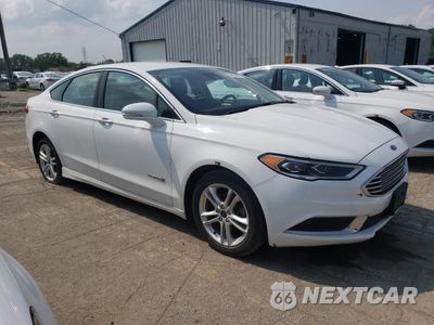 Czwarte zdjęcie samochodu z boku: 2018 FORD FUSION SE HYBRID VIN:3FA6P0LU0JR129853 - miniatura