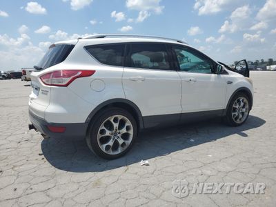 Trzecie zdjęcie samochodu z tyłu: 2014 FORD ESCAPE TITANIUM VIN:1FMCU0J92EUE47732 - miniatura