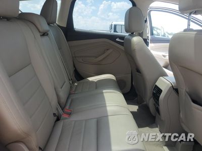 Zdjęcie 11 z 15 samochodu: 2014 FORD ESCAPE TITANIUM VIN:1FMCU0J92EUE47732 - miniatura