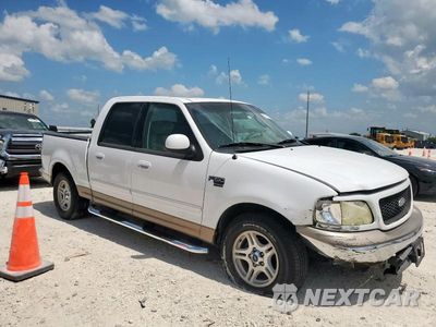 Czwarte zdjęcie samochodu z boku: 2002 FORD F150 SUPERCREW VIN:1FTRW07662KD61451 - miniatura
