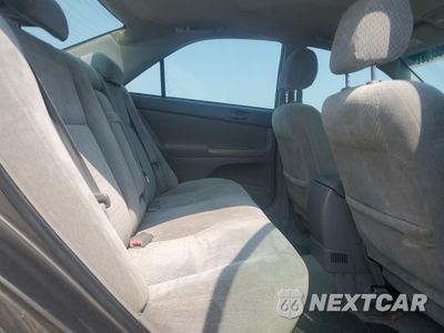 Zdjęcie 10 z 12 samochodu: 2003 TOYOTA CAMRY LE VIN:4T1BE32K93U777859 - miniatura