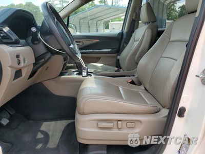 Zdjęcie 7 z 15 samochodu: 2017 HONDA PILOT EXL VIN:5FNYF5H57HB045478 - miniatura