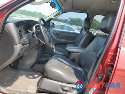 Zdjęcie 7 z 15 samochodu: 2003 MAZDA TRIBUTE ES VIN:4F2CZ061X3KM16343 - miniatura