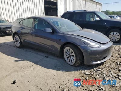Czwarte zdjęcie samochodu z boku: 2023 TESLA MODEL 3 VIN:5YJ3E1EB9PF463815 - miniatura