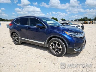 Czwarte zdjęcie samochodu z boku: 2019 HONDA CR-V TOURING VIN:7FARW1H97KE015652 - miniatura