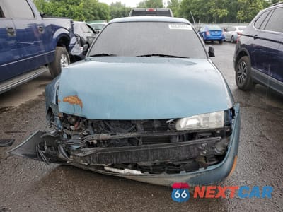 Piąte zdjęcie samochodu w środku: 1995 TOYOTA COROLLA LE VIN:2T1AE09B2SC124256 - miniatura