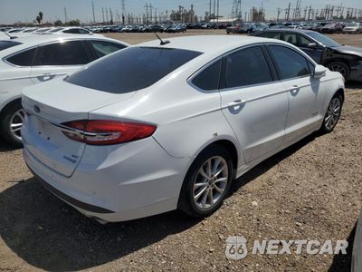 Trzecie zdjęcie samochodu z tyłu: 2017 FORD FUSION SE HYBRID VIN:3FA6P0LU9HR409300 - miniatura