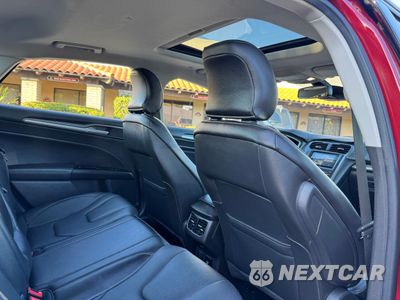Zdjęcie 6 z 11 samochodu: 2016 FORD FUSION TITANIUM PHEV VIN:3FA6P0SUXGR320707 - miniatura