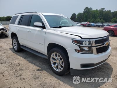 Czwarte zdjęcie samochodu z boku: 2019 CHEVROLET TAHOE C1500 LT VIN:1GNSCBKC8KR208314 - miniatura