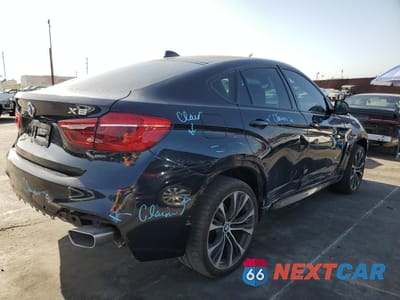 Trzecie zdjęcie samochodu z tyłu: 2018 BMW X6 XDRIVE35I VIN:5UXKU2C56J0Z62755 - miniatura