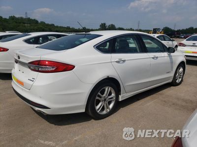 Trzecie zdjęcie samochodu z tyłu: 2018 FORD FUSION SE HYBRID VIN:3FA6P0LU2JR129949 - miniatura