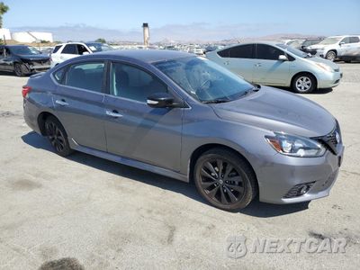 Czwarte zdjęcie samochodu z boku: 2018 NISSAN SENTRA S VIN:3N1AB7AP7JY287916 - miniatura