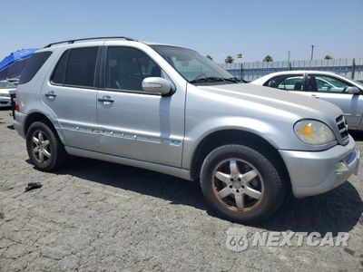 Czwarte zdjęcie samochodu z boku: 2002 MERCEDES-BENZ ML 500 VIN:4JGAB75E32A362473 - miniatura