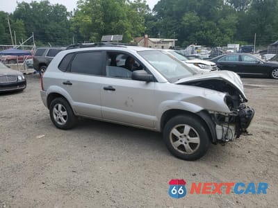 Czwarte zdjęcie samochodu z boku: 2006 HYUNDAI TUCSON GL VIN:KM8JM12B26U457662 - miniatura