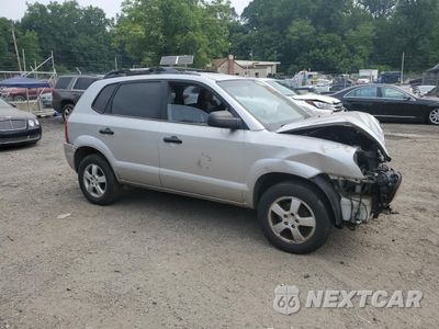 Czwarte zdjęcie samochodu z boku: 2006 HYUNDAI TUCSON GL VIN:KM8JM12B26U457662 - miniatura