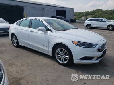 Czwarte zdjęcie samochodu z boku: 2018 FORD FUSION SE HYBRID VIN:3FA6P0LU1JR118733 - miniatura