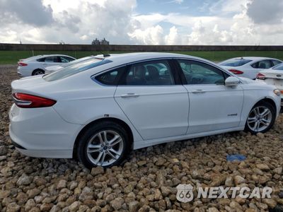 Trzecie zdjęcie samochodu z tyłu: 2018 FORD FUSION SE HYBRID VIN:3FA6P0LU0JR172007 - miniatura